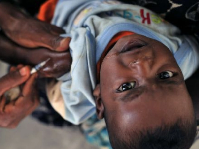 baby getting immunization shot